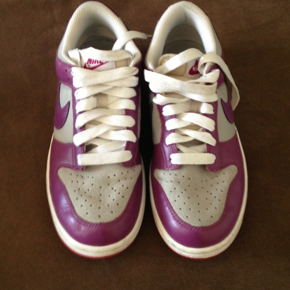 Purple and gray Nike shoes