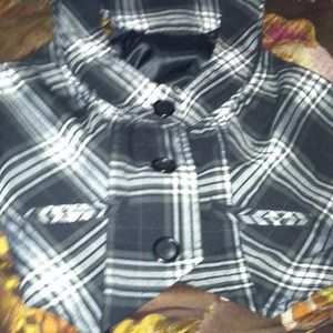 A black and white vest very cute!!!