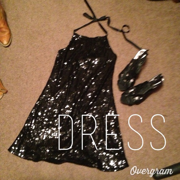 Black sequin halter dress.