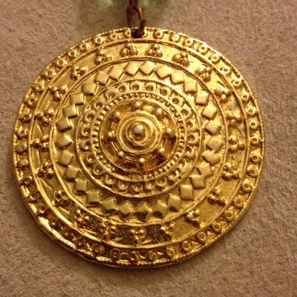 Necklace with gold medallion
