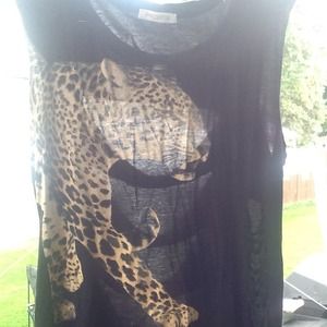 Sheer black sexy leopard top .