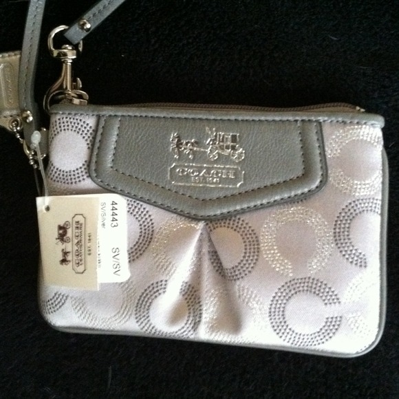 Coach wristlet******hold for A Williams