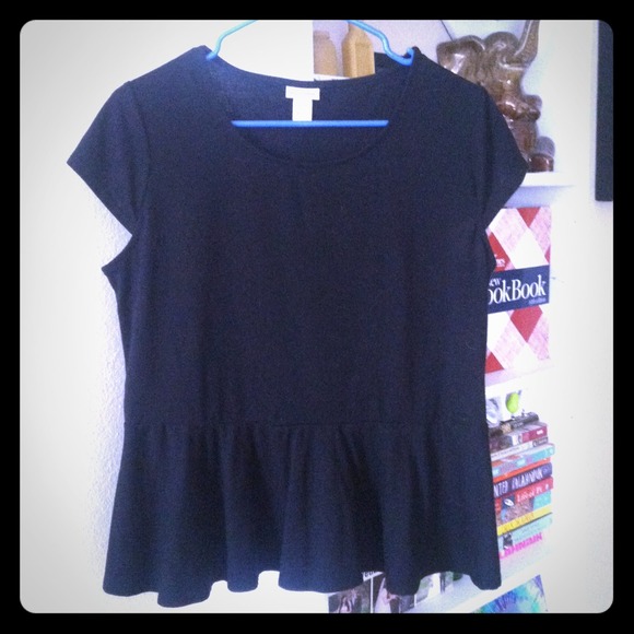 Black peplum top. Very flattering.
