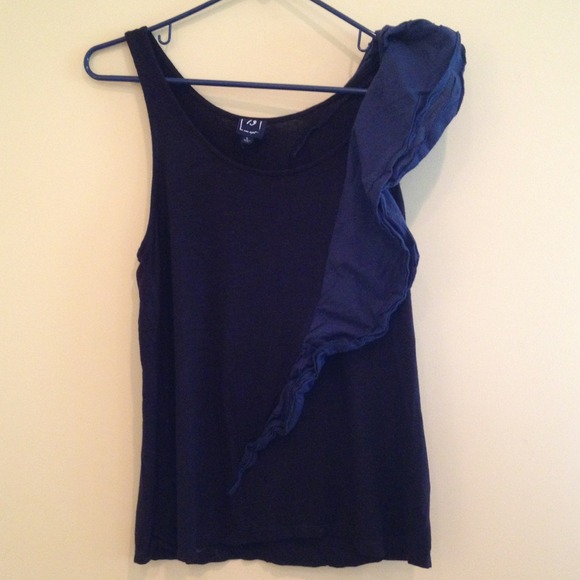 Fun black short sleeve with asymmetric navy ruffle