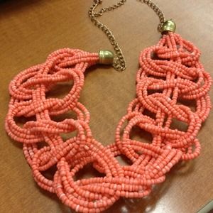 Orange beaded necklace up for grabs!