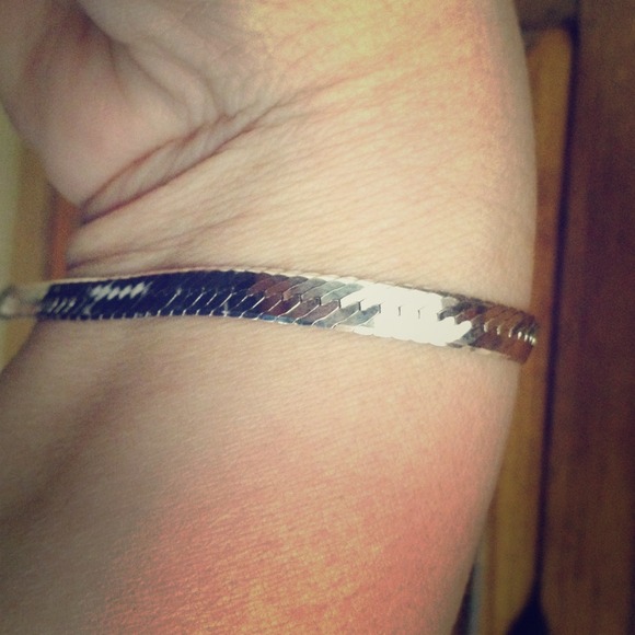 Silver bracelet.