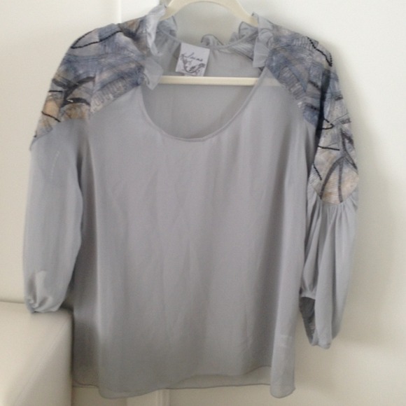 Anthropologie dust blue top with shoulder accents