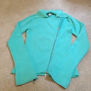 It is a cute Fancy Turquoise sweater zip up