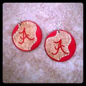 Hand painted wood earrings with unique designs.