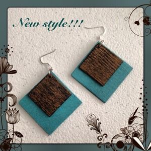 Hand painted wood earrings with unique designs.