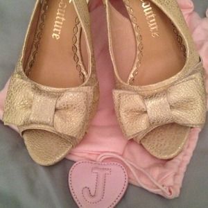 Juicy Couture gold open toe slingback.