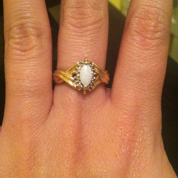 Opal and diamond ring