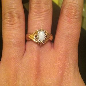 Opal and diamond ring