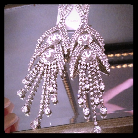 Chandelier crystal earrings on surgical post. Hot!