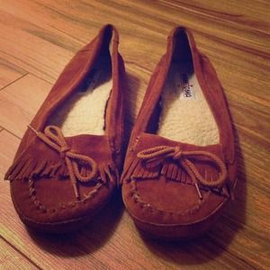Minnetonka Moccasins in tan.