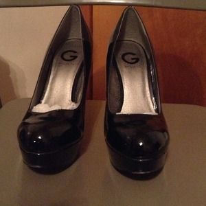 Black patent leather pumps