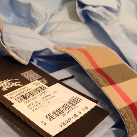 A large button down cotton shirt from Burberry.