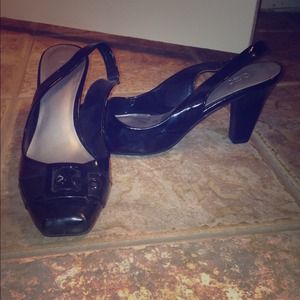 Black heels with a cute little buckle on top