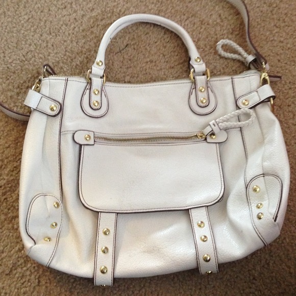 White Steve Madden purse with gold accents!