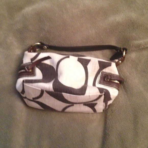 Small brown and white coach purse