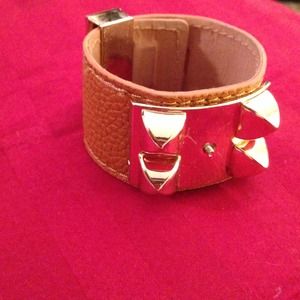Hermes brown with gold color bracelace