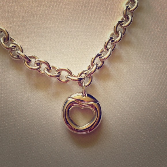 Auth Movado sterling silver necklace & bracelet.