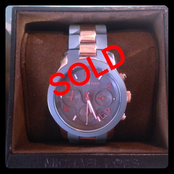 Sold on ebay. Michael Kors NWT grey/rose gold