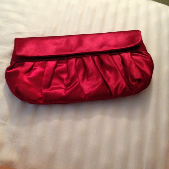 LOFT Handbags - Never used satin maroon purse from the LOFT!!