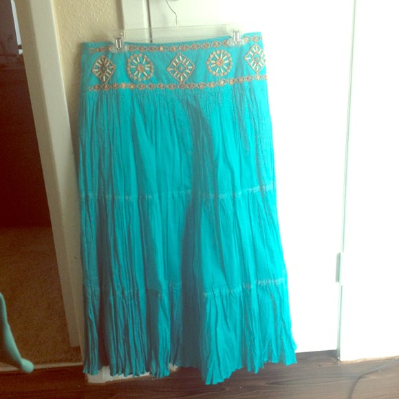 Turquoise skirt with matching shirt