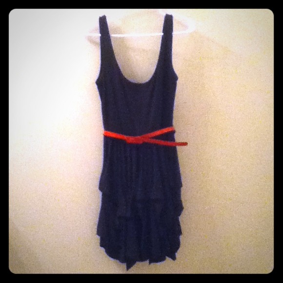 Black dress with red belt and a hanky hem