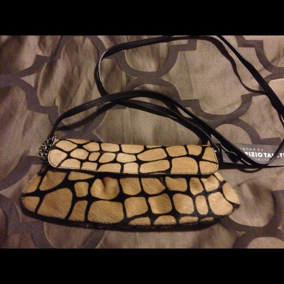 Maurizio Taiuti Clutch