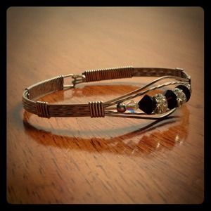 Handmade silver bracelet with beaded detail