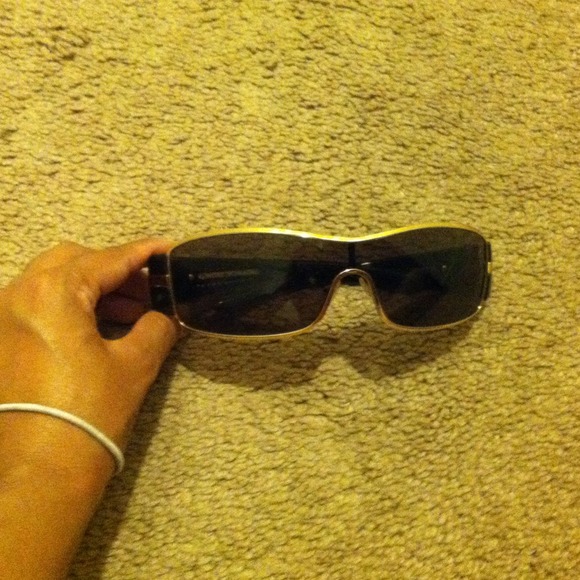 Authentic Prada sun glasses on hold