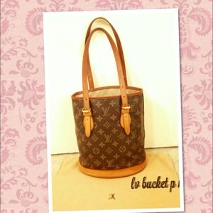 * 💯% authentic lv bucket Pm. Hold for npesce01