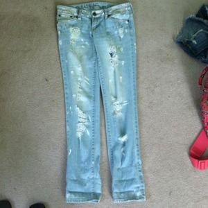size 0 paint splattered jeans