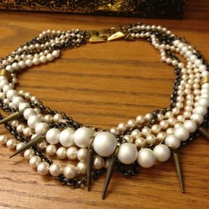 Pearl and gold chain choker.