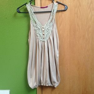 Tan racer tank with crochet embellishment