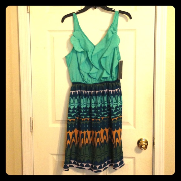 Cute ruffle top dress with patterned bottom