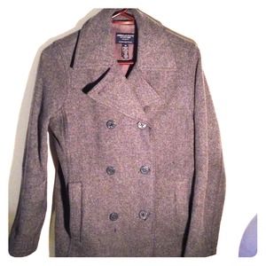 Grey button down coat.