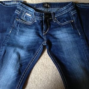 Faded/slightly distressed boot cut  jeans