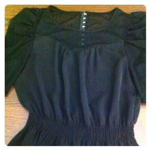 Top with elastic waist and peplum