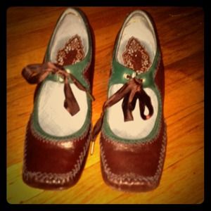 These are maroon and blue lace tie shoes.