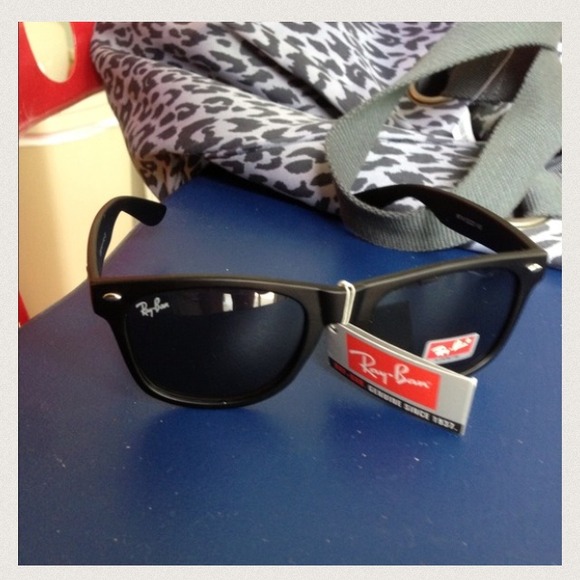 Flat black Ray bans brand new. Silver emblems