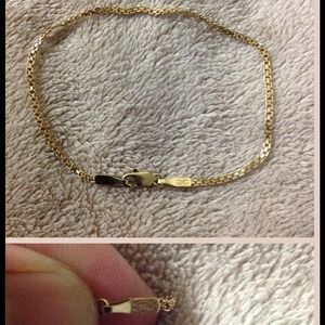 14k bracelet and 10k yellow gold peridot ring