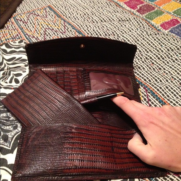 Brahmin leather wallet with checkbook insert.