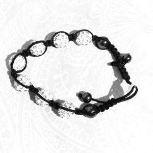 A white and Silver Shambala bracelet