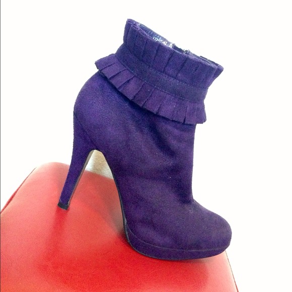Purple faux suede ankle boots.