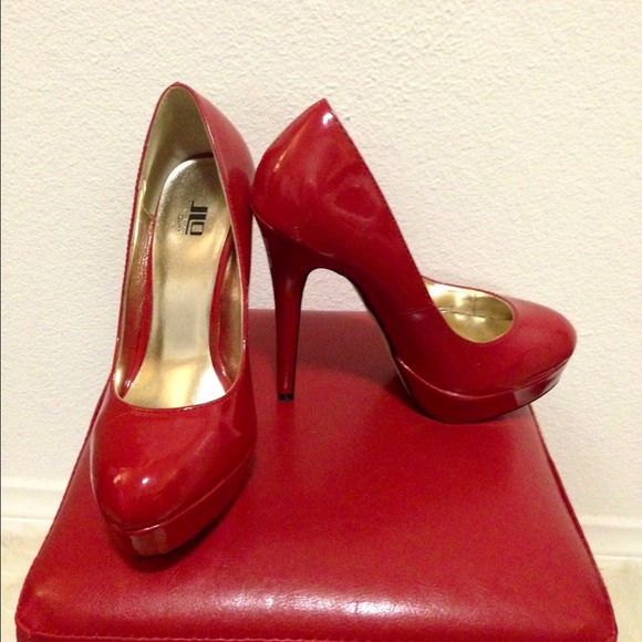 Red patent pumps
