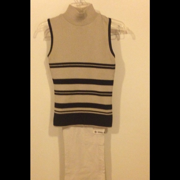 Lightweight sleeveless mock turtleneck sweater