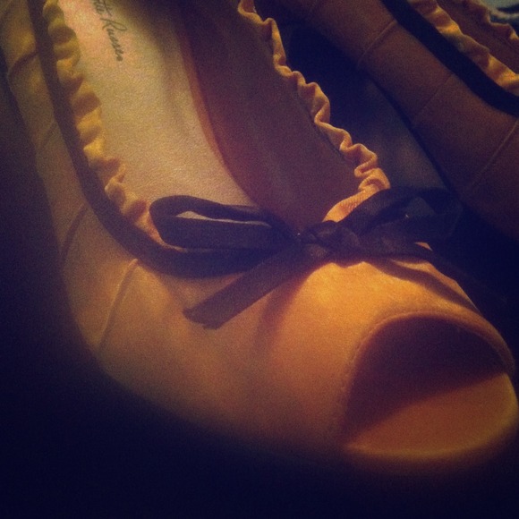 Yellow and black formal heels